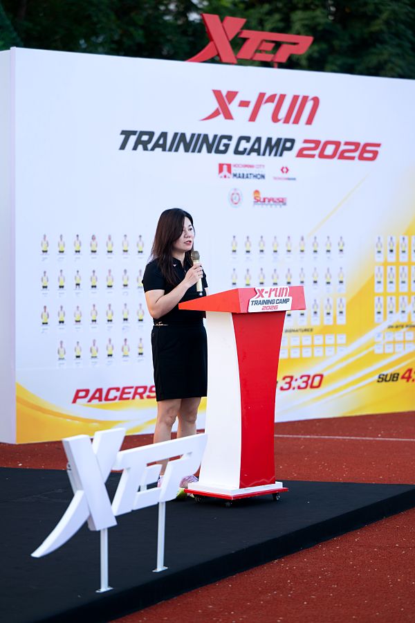 XTEP tiếp sức runner từ đường tập đến vạch xuất phát